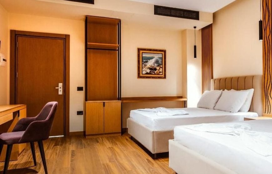 Double Deluxe Room with Extra Bed