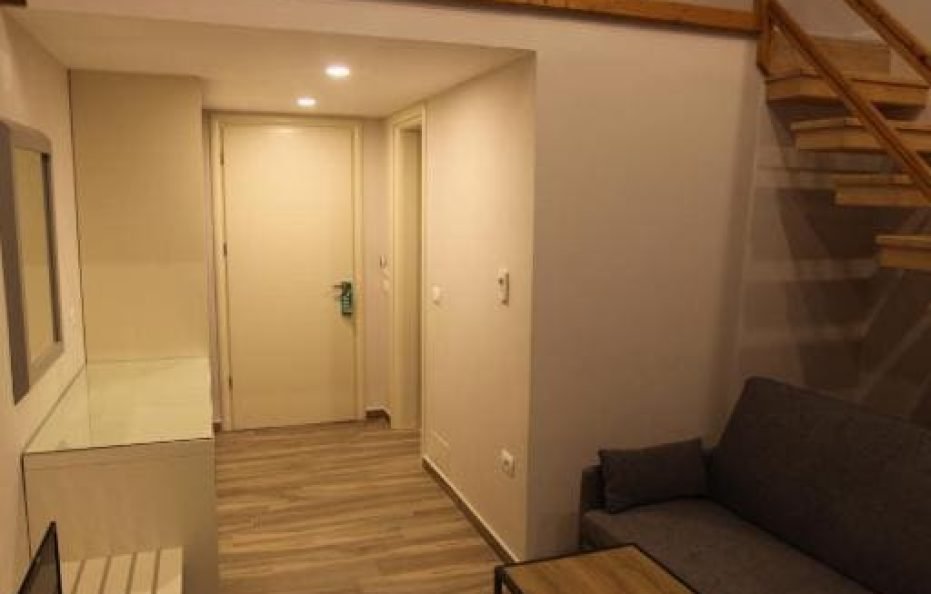 Duplex Family Room With Balcony