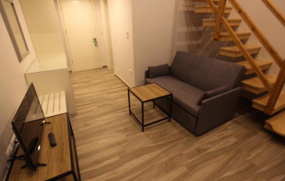 Duplex Family Room With Balcony